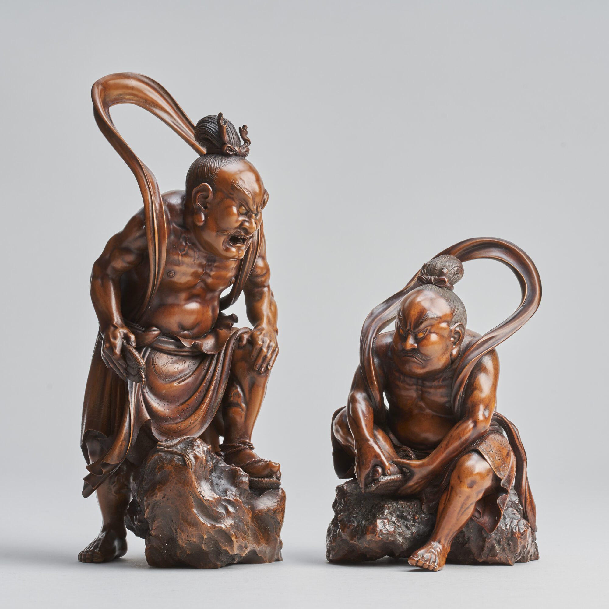 A fascinating, Japanese wood-carved Okimono pair of Temple Guardians (Nio) from Kevin Page